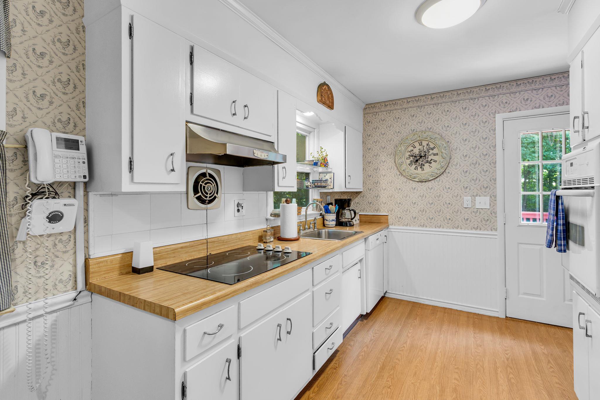 14 Griffen Road Brewster, NY 10509 - Photo 10 of 30 a kitchen with a sink a stove and cabinets
