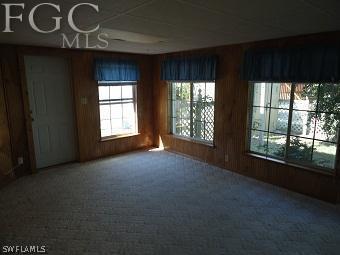 4852 Riverside Drive Estero, FL 33928 - Photo 3 of 9 a view of an empty room with a window