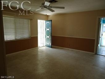 4852 Riverside Drive Estero, FL 33928 - Photo 6 of 9 a view of an empty room with a window