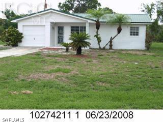 4852 Riverside Drive Estero, FL 33928 - Photo 9 of 9 a view of a house with backyard