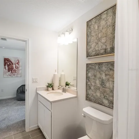 a bed room with a bed and a couch