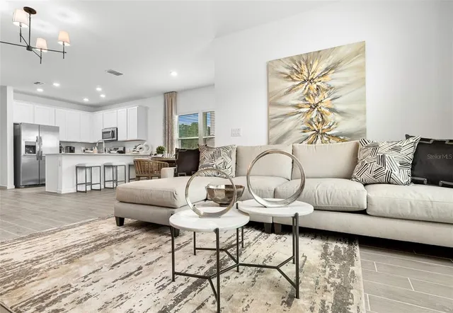 a kitchen with dining table and chairs