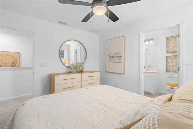 a close view of a bathroom with mirror