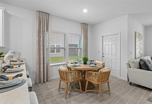 a kitchen with a sink stove and microwave