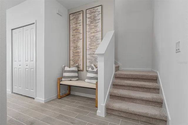 a view of a chair and table in the balcony