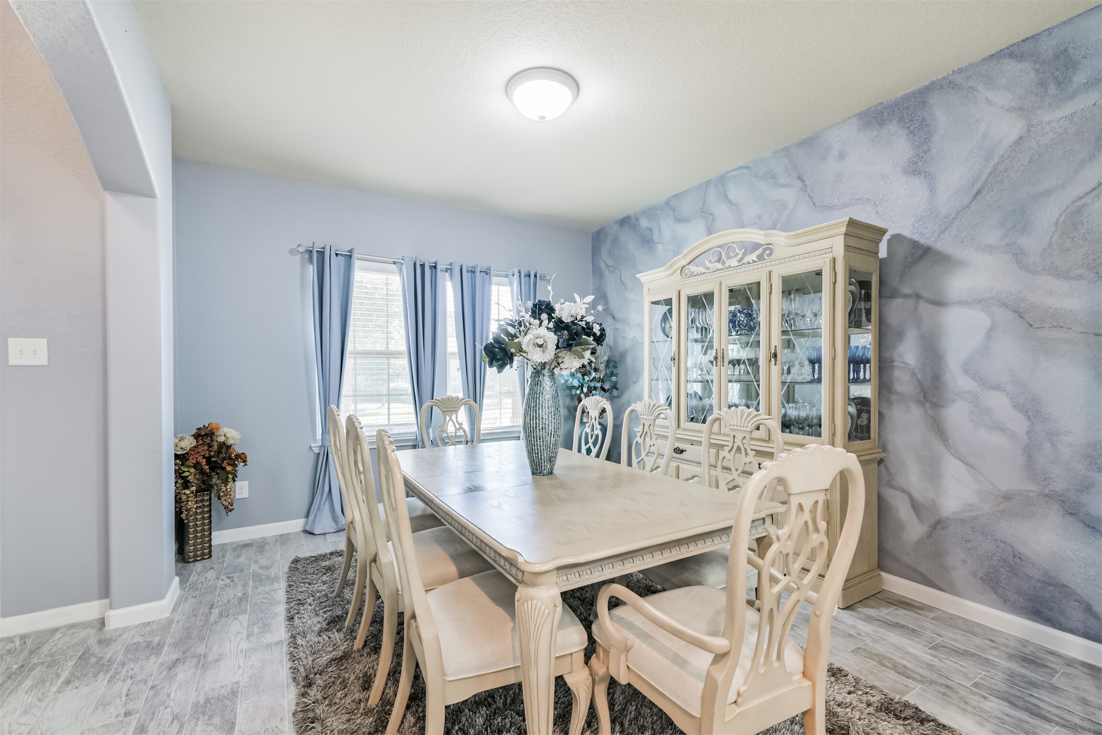 24047 Schults Meadow Lane Spring, TX 77389 - Photo 5 of 47 a view of a dining room with furniture and chandelier