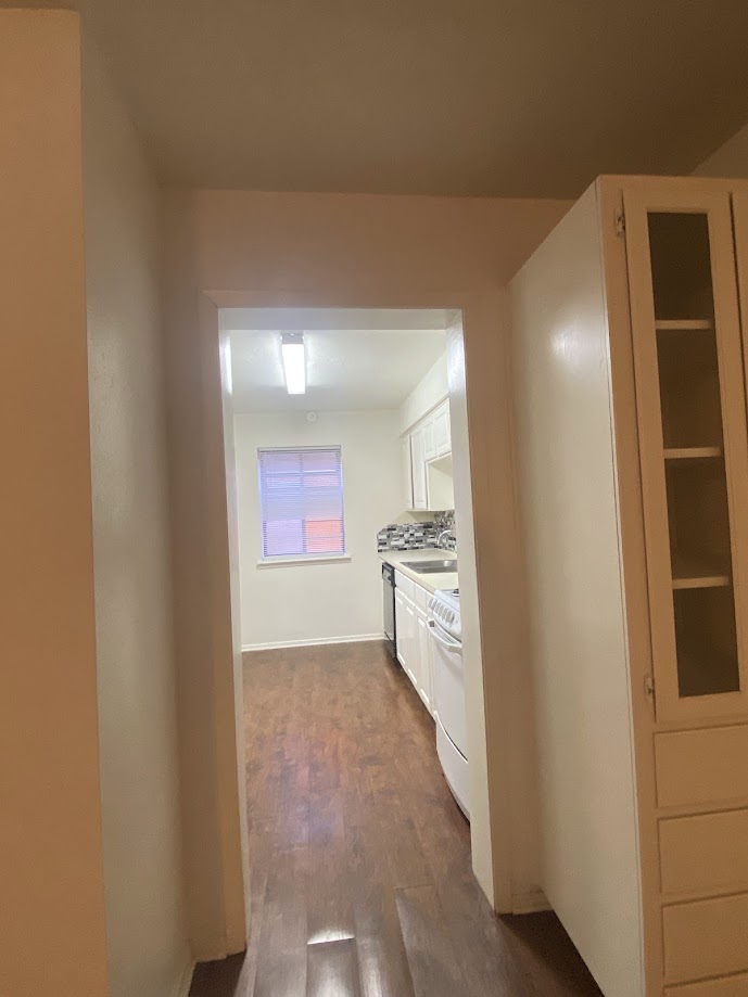 1305 West Villa Maria Road, Unit C103 Bryan, TX 77801 - Photo 6 of 19 a view of hallway with washer and dryer