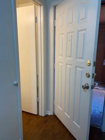 a view of a closet in a bathroom