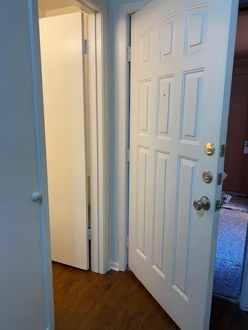 a view of a closet in a bathroom