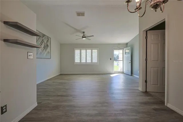 a view of livingroom with hardwood floor and window