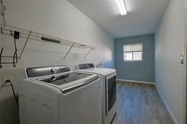 a utility room with dryer and washer