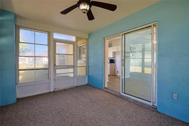 a view of an empty room and window