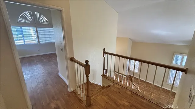 a view of entryway with wooden floor