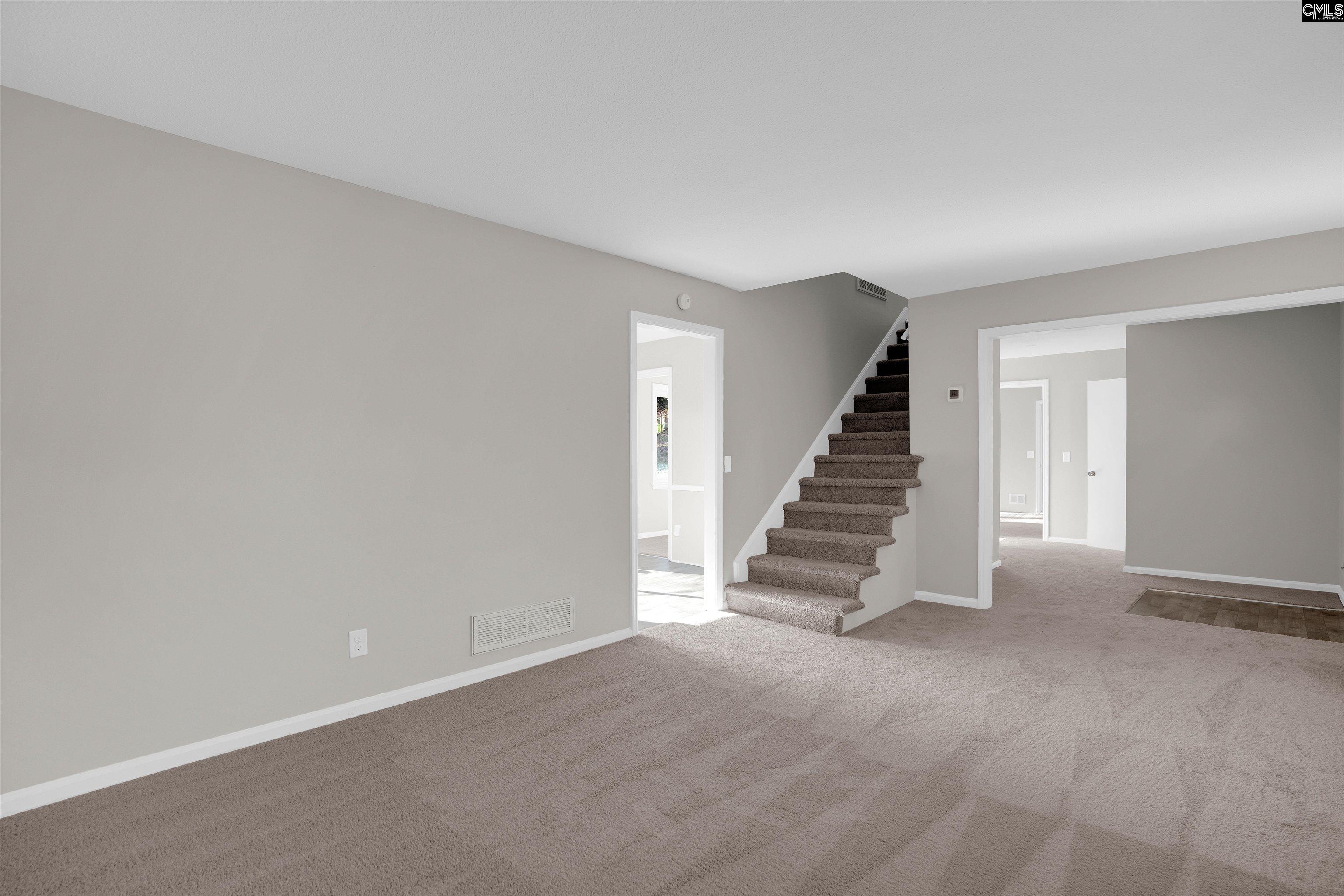 2620 Pleasant Ridge Drive Columbia, SC 29209 - Photo 5 of 37 a view of an empty room with stairs