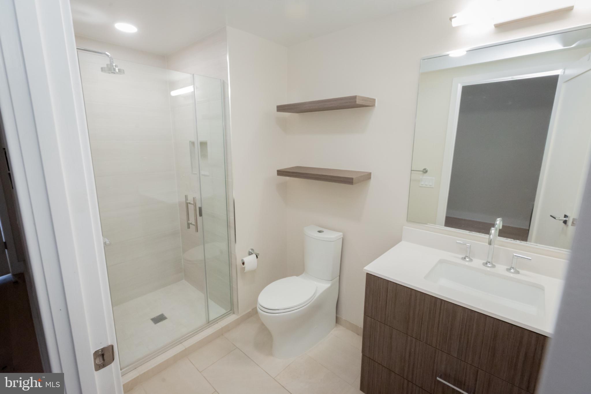 1211 Van Street Southeast, Unit TH1C Washington, DC 20003 - Photo 9 of 31 Sleek modern bathroom oasis.