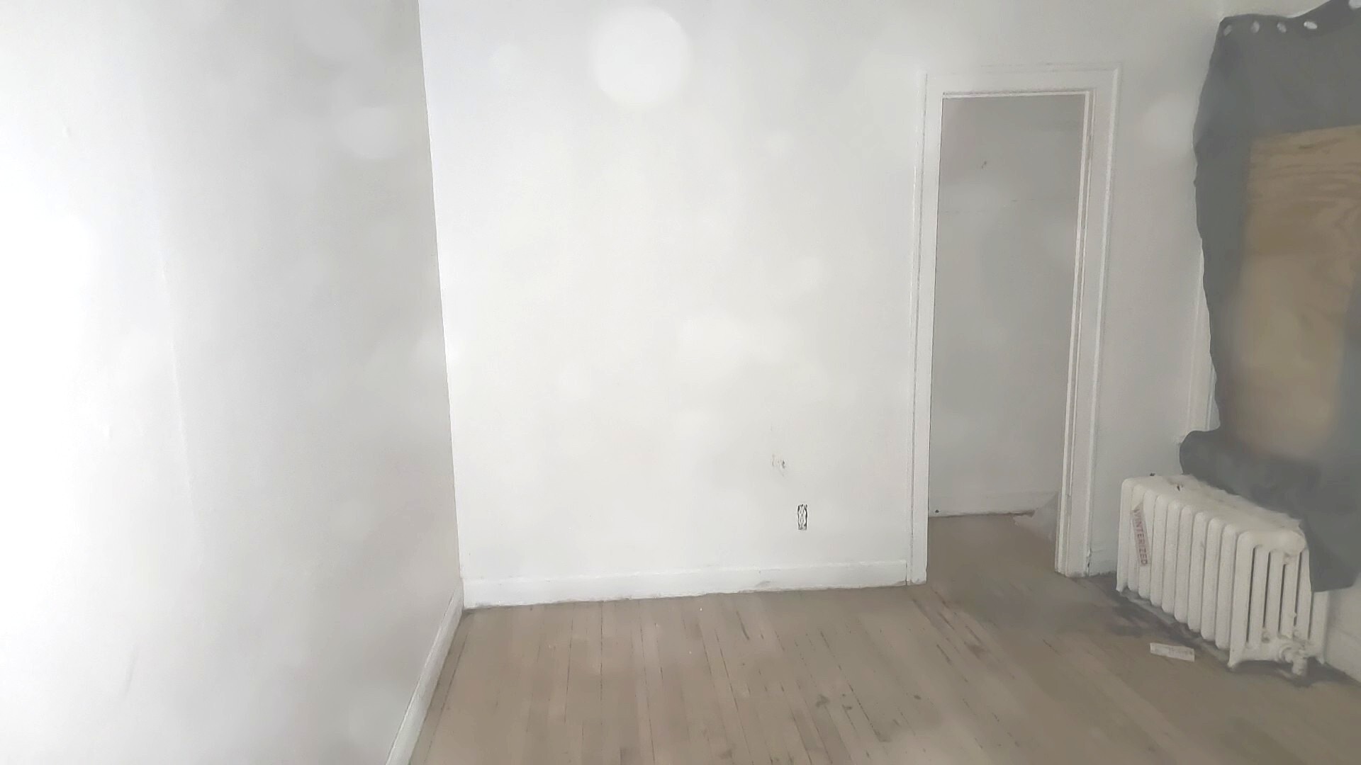 8216 South Rhodes Avenue Chicago, IL 60619 - Photo 13 of 22 a view of an empty room