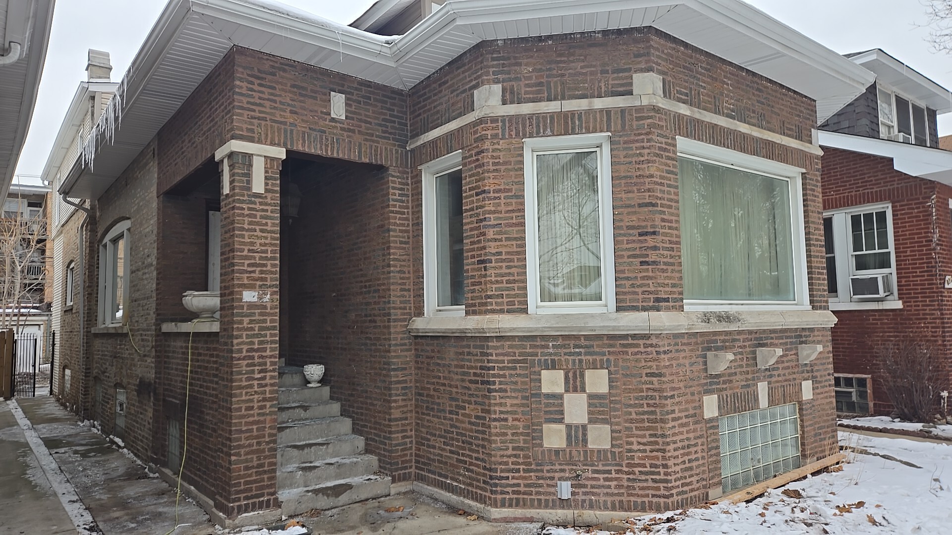 8216 South Rhodes Avenue Chicago, IL 60619 - Photo 3 of 22 a front view of a building