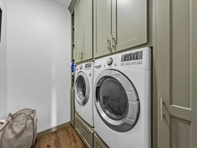 a utility room with dryer and washer