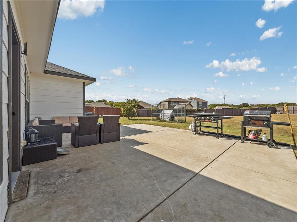 14201 Bridgeview Lane Dallas, TX 75253 - Photo 21 of 26 a view of a terrace with water view