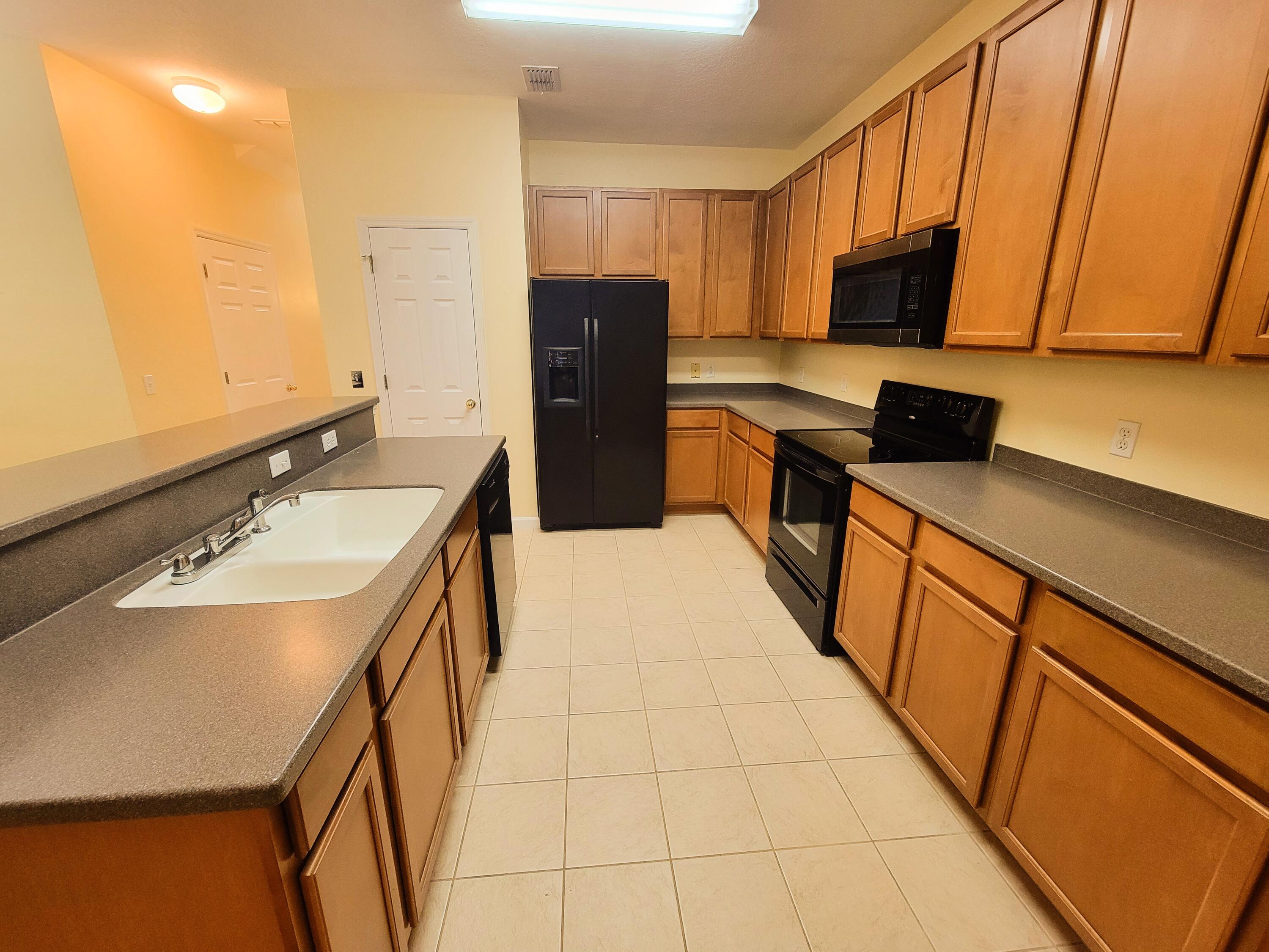 2775 Reston Street, Unit 101 Melbourne, FL 32935 - Photo 7 of 31 Reston kitchen 2