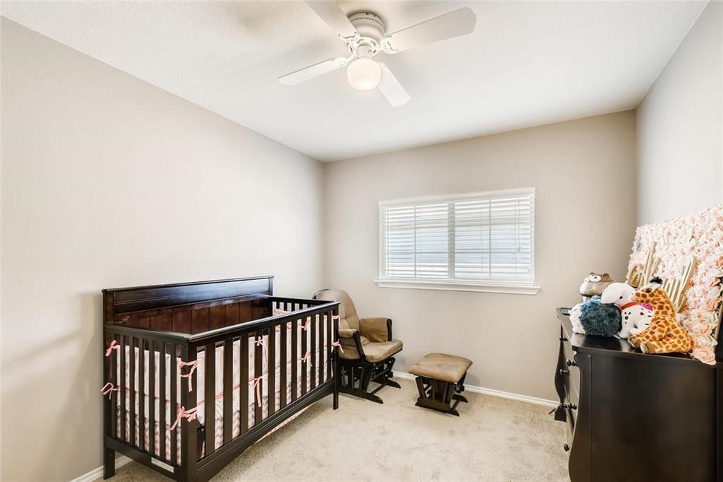 1149 Apollo Circle Round Rock, TX 78664 - Photo 2 of 14 a bedroom with furniture and a window