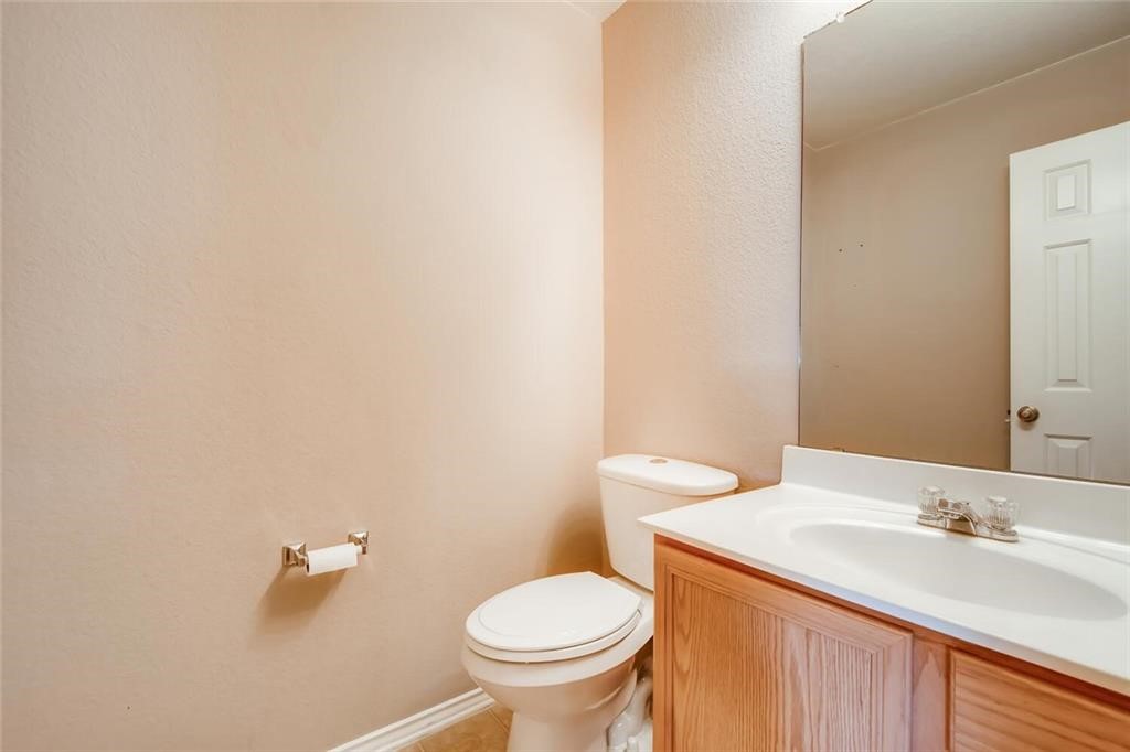 1149 Apollo Circle Round Rock, TX 78664 - Photo 5 of 14 a bathroom with a sink and a toilet