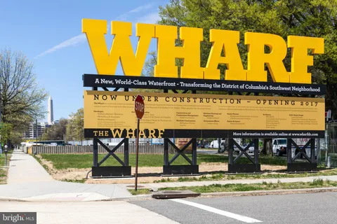 a view of a building with sitting area