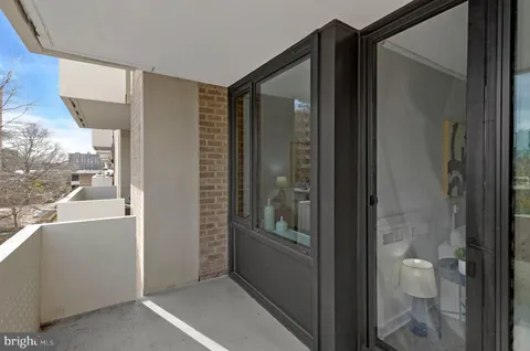 a view of a bathroom with a glass door