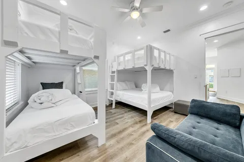 a bathroom with a sink a mirror and a vanity