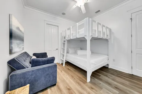 a bathroom with a sink mirror and toilet