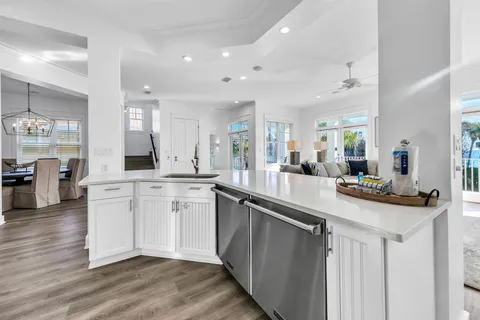 a view of a patio with a table chairs and a table
