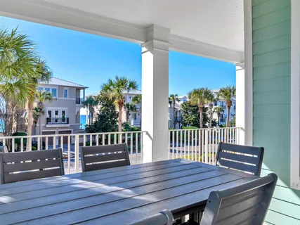 a living room with fireplace furniture and a window
