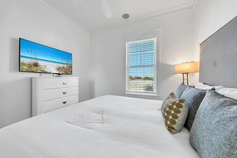 a view of swimming pool with outdoor seating and plants