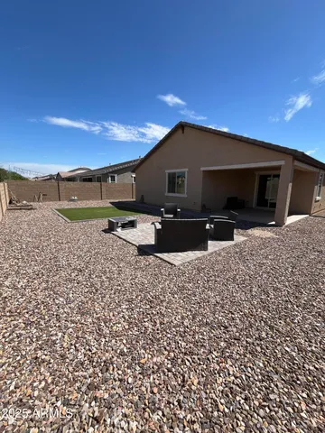 a view of a big yard with a lake view