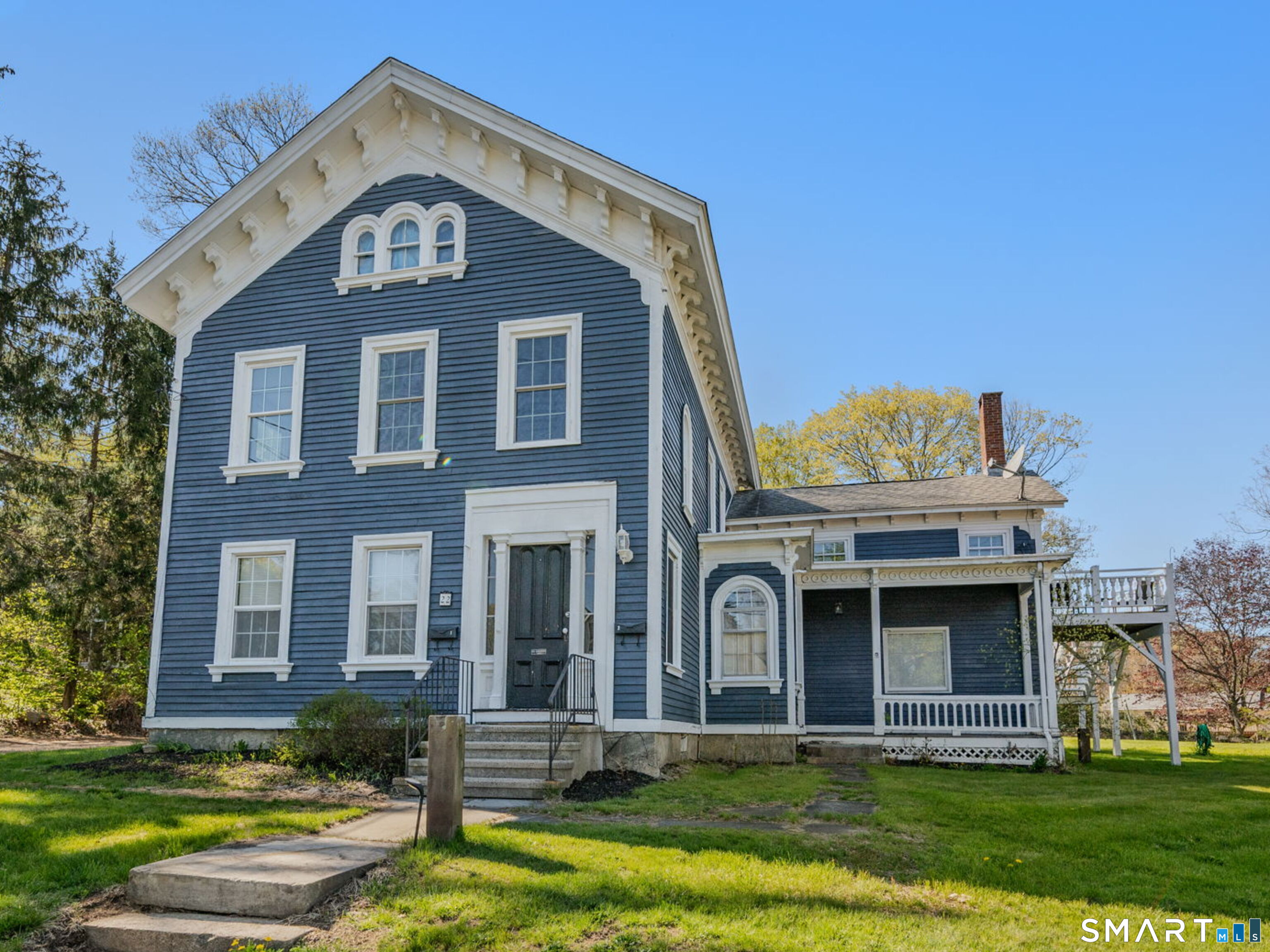 22 West High Street East Hampton, CT 06424 - Photo 1 of 40 a front view of a house with garden