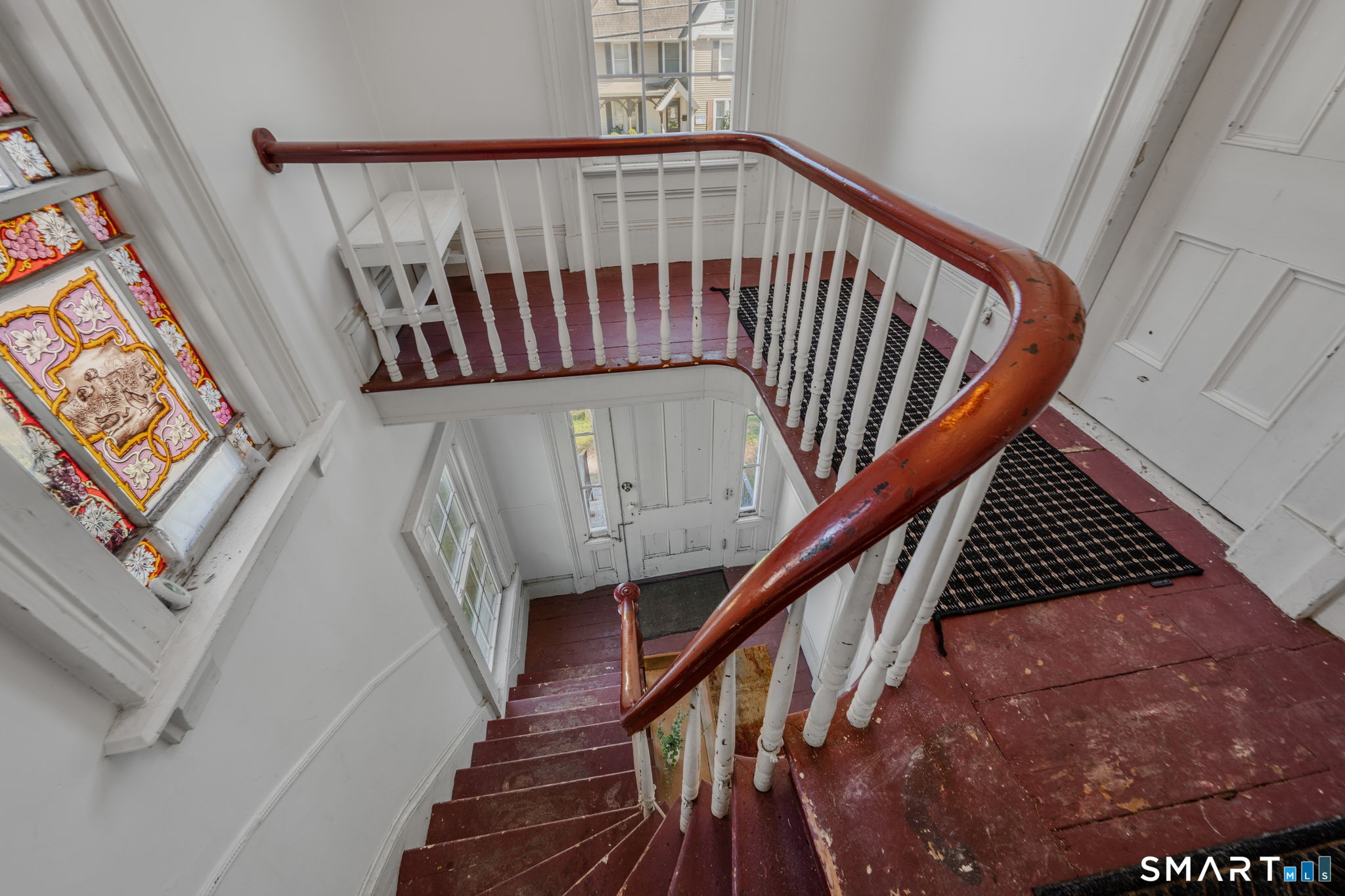 22 West High Street East Hampton, CT 06424 - Photo 19 of 40 a view of staircase with wooden floor and white walls