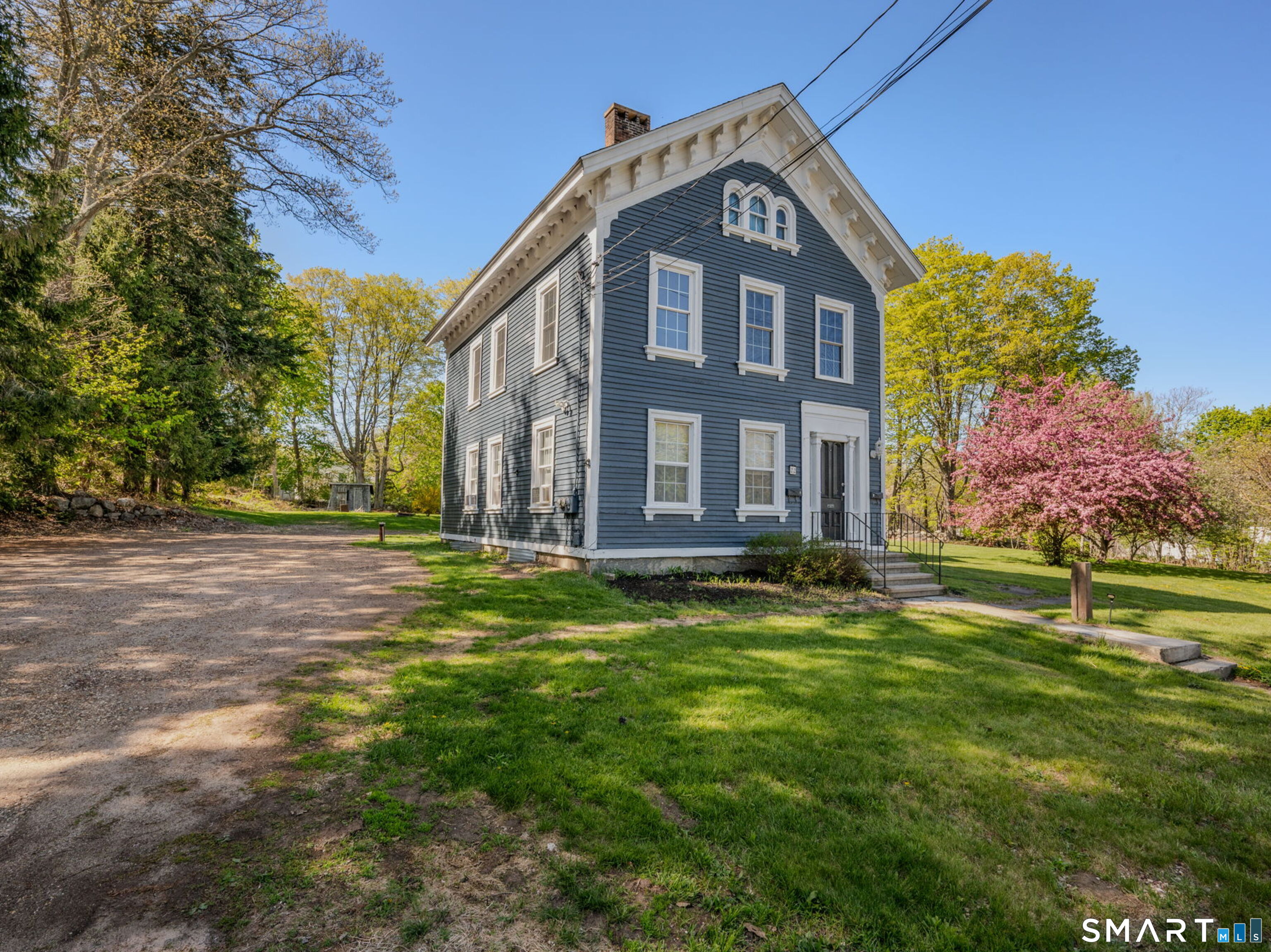 22 West High Street East Hampton, CT 06424 - Photo 3 of 40 a front view of a house with a yard