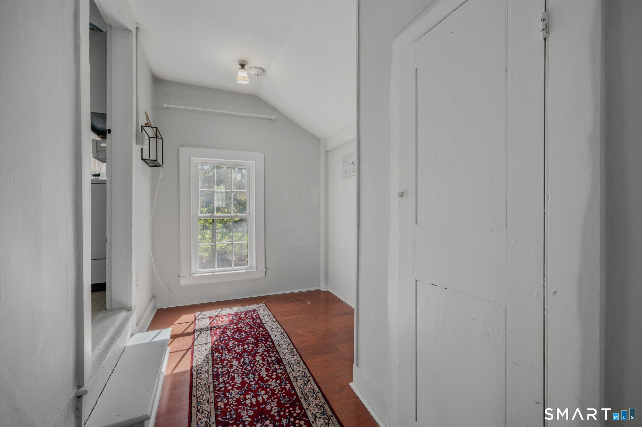 22 West High Street East Hampton, CT 06424 - Photo 31 of 40 a bedroom with a bed and a window