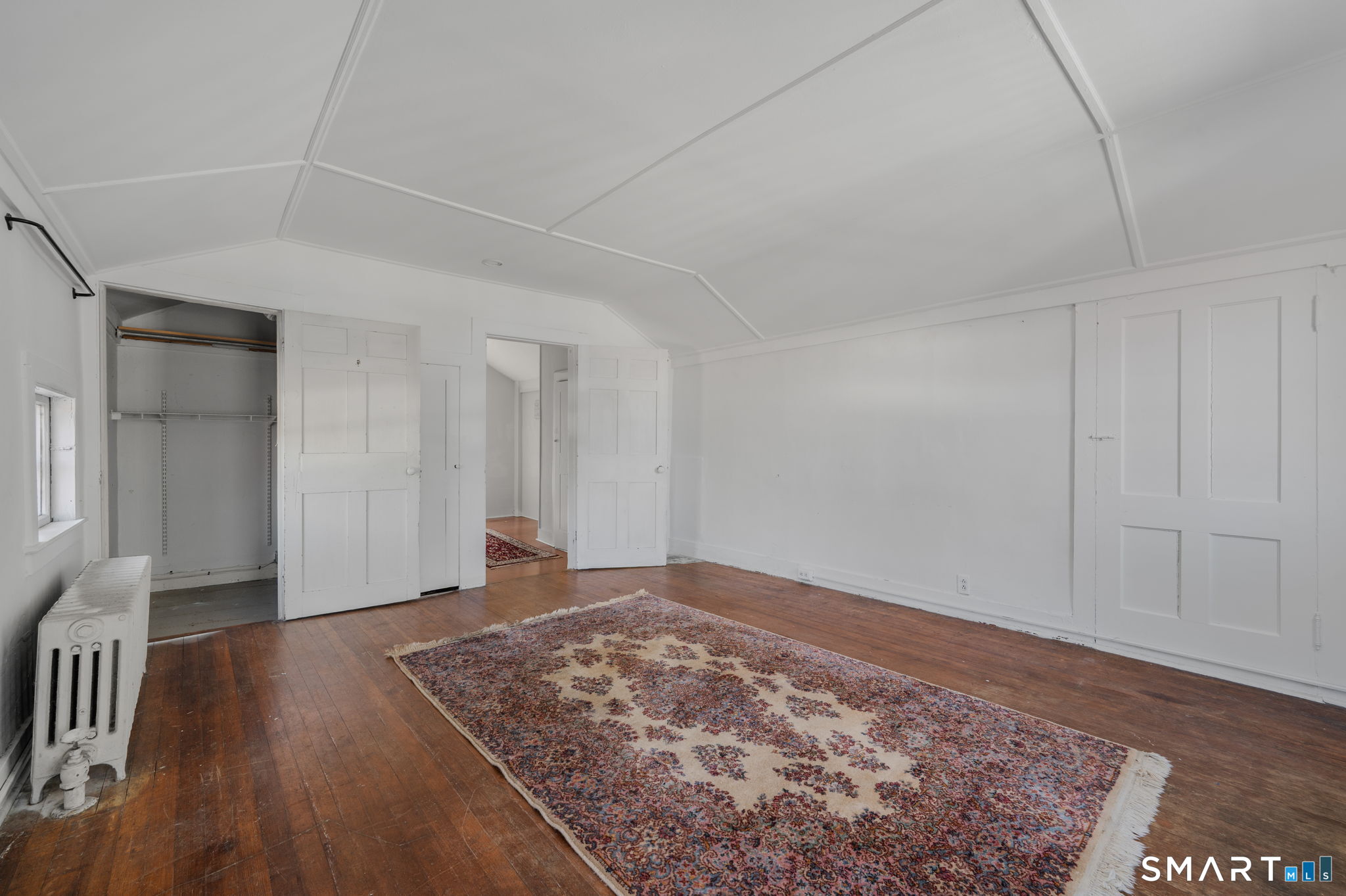 22 West High Street East Hampton, CT 06424 - Photo 34 of 40 a view of an empty room and wooden floor