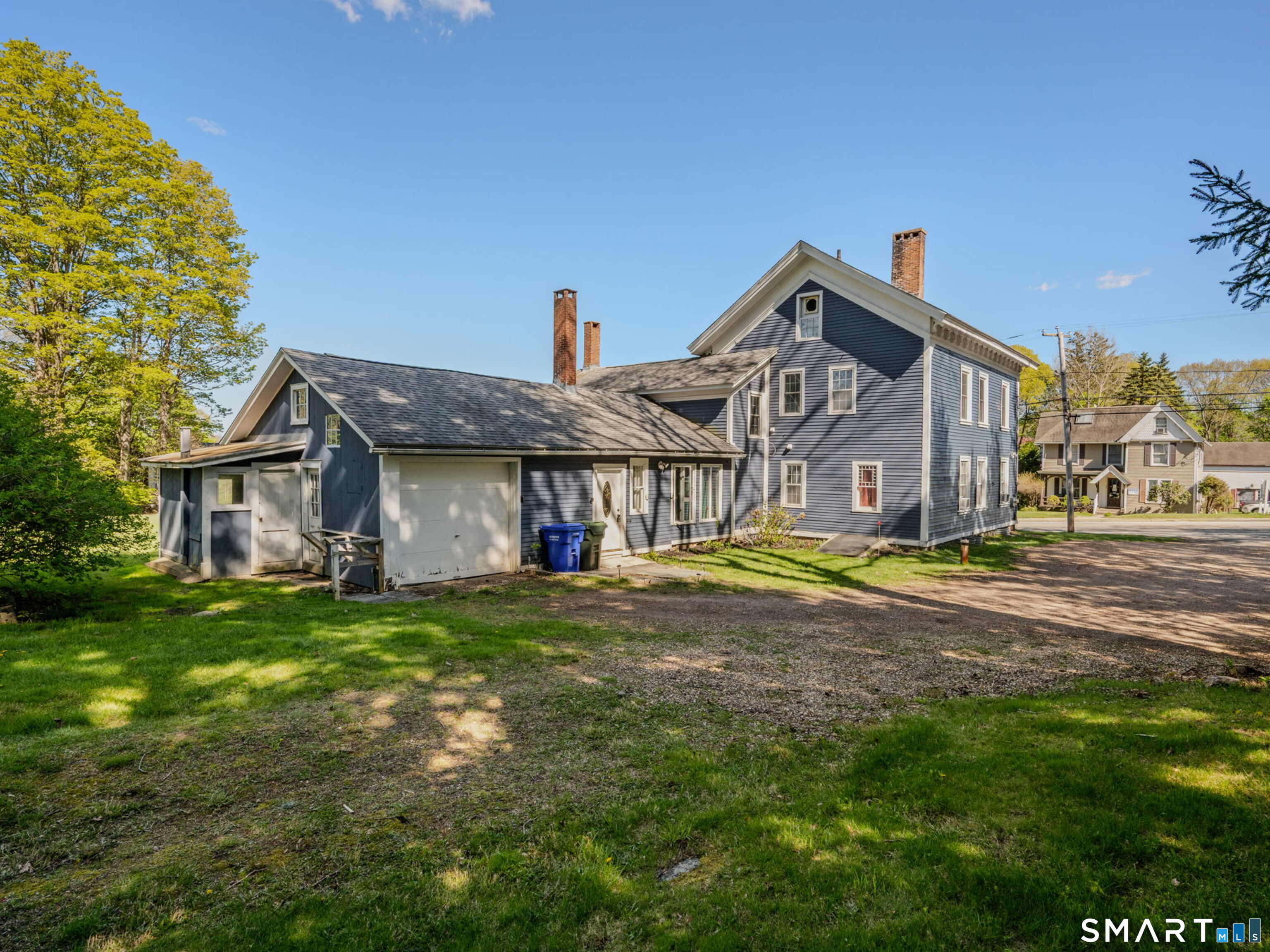 22 West High Street East Hampton, CT 06424 - Photo 35 of 40 a view of a house with a big yard and large trees