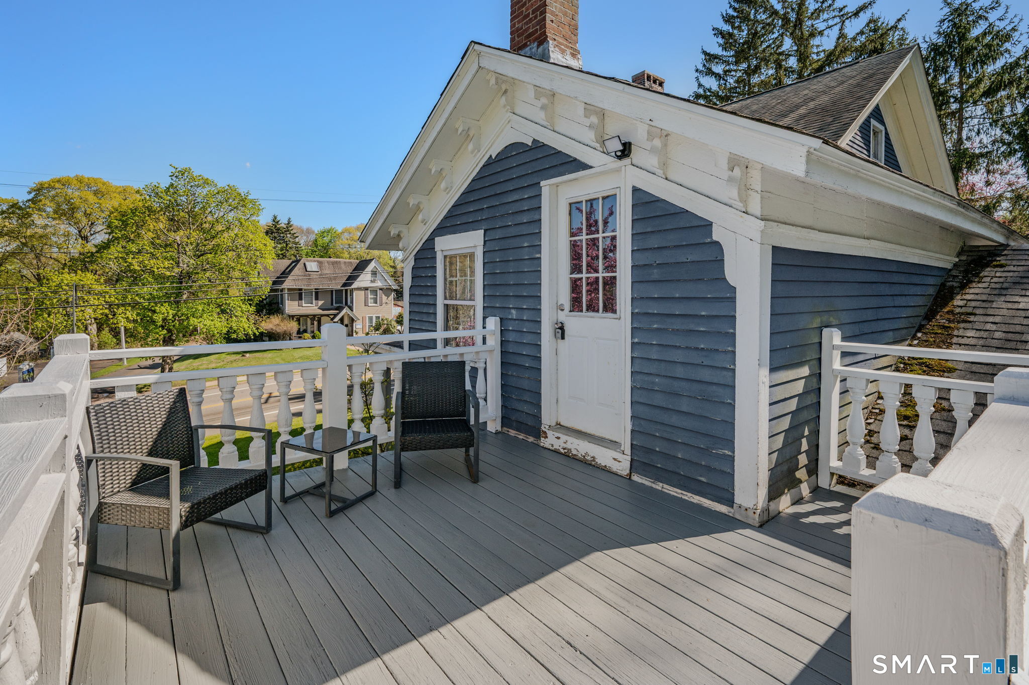 22 West High Street East Hampton, CT 06424 - Photo 5 of 40 a roof deck with chairs and wooden floor