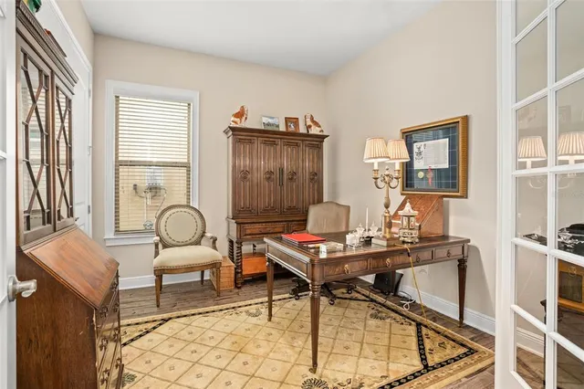 a view of house with yard and green space