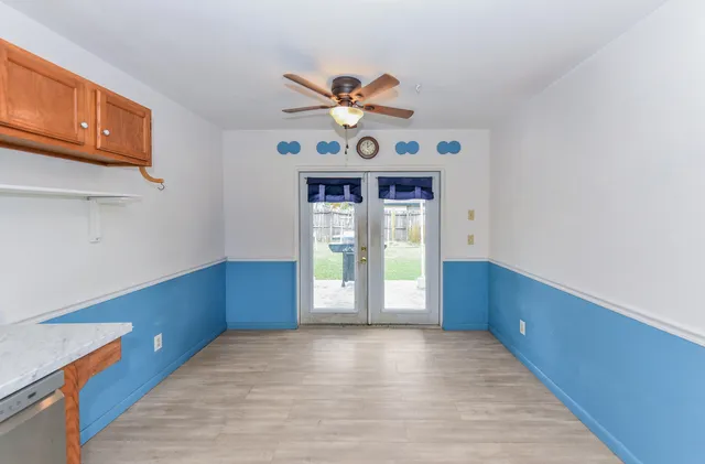 a view of an empty room and window