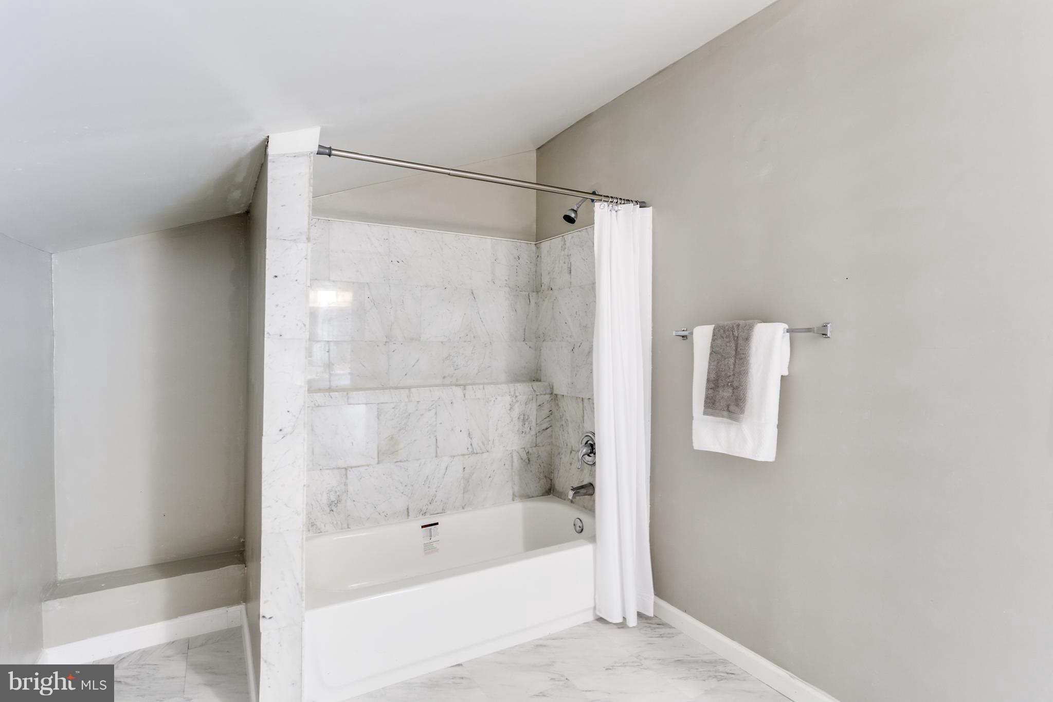 4504 Ritchie Highway Baltimore, MD 21225 - Photo 14 of 21 Remodeled Bath with Ceramic Tile