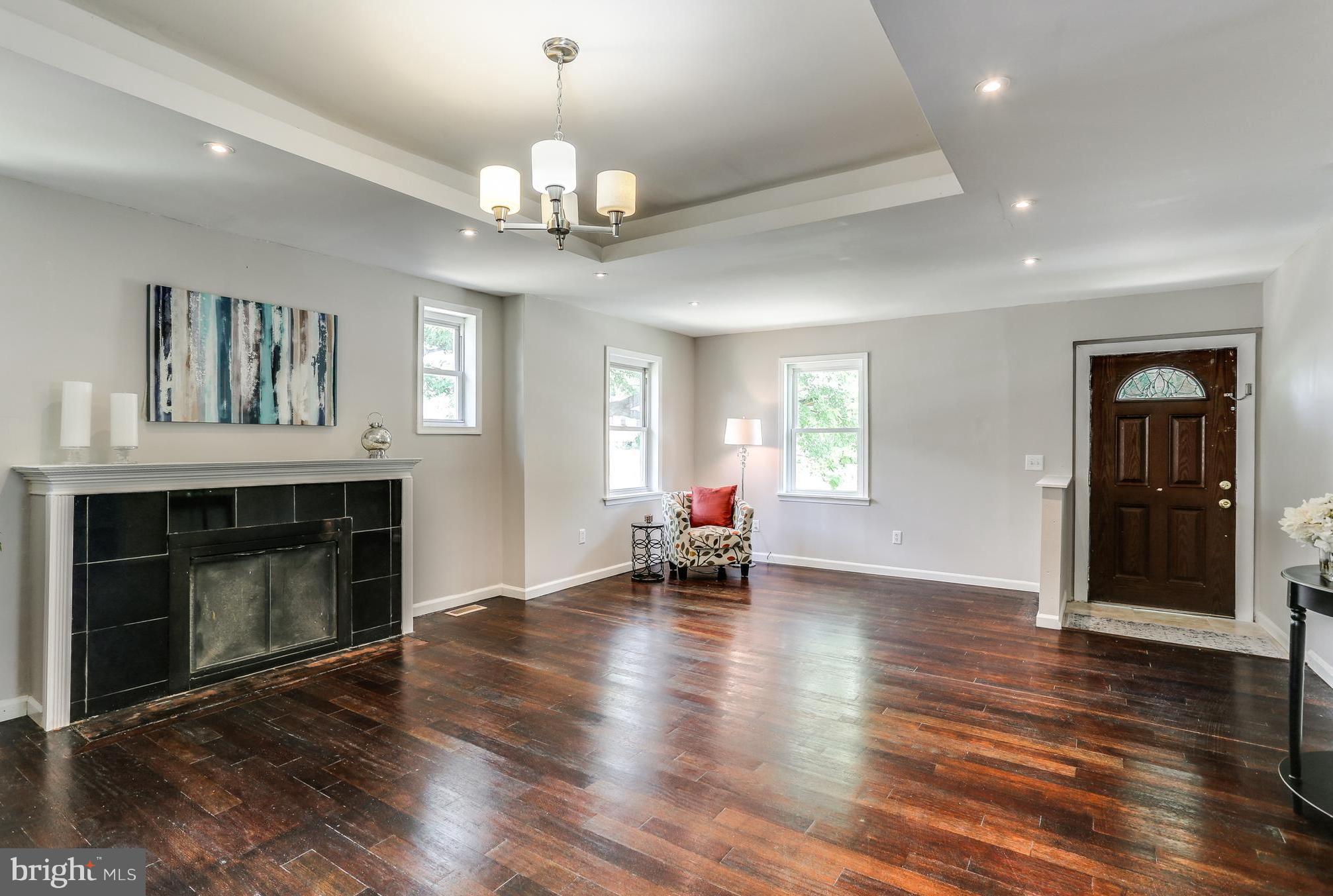 4504 Ritchie Highway Baltimore, MD 21225 - Photo 6 of 21 Living Room with Refinished Hardwood Floors
