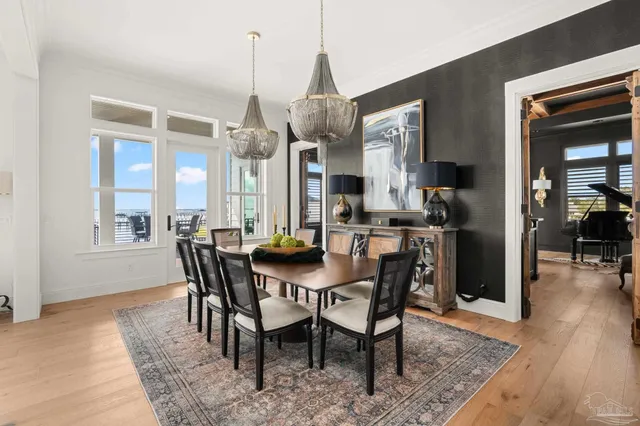 a work room with furniture and a flat screen tv