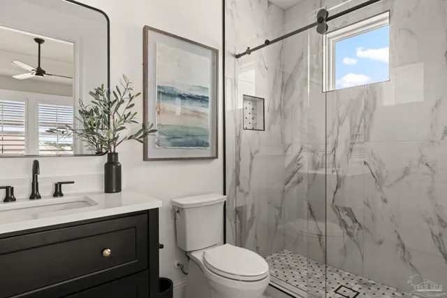 a view of a lake with houses in the background