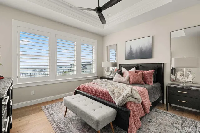 a view of swimming pool with outdoor seating and plants