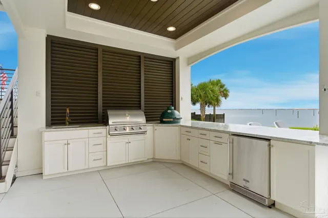 an aerial view of a house with a swimming pool