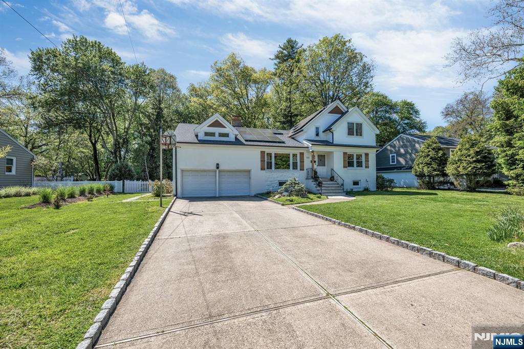 433 Piermont Road Cresskill, NJ 07626 - Photo 3 of 49 a front view of house with yard and green space